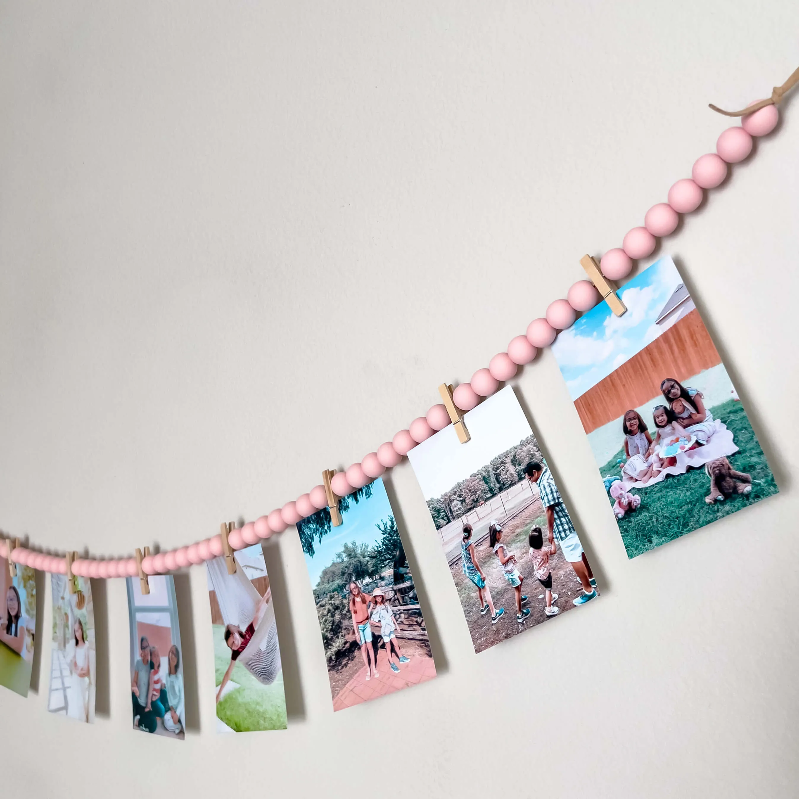 Photo display with 12 clothespins